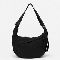 Sac bandoulière en toile souple et spacieux
